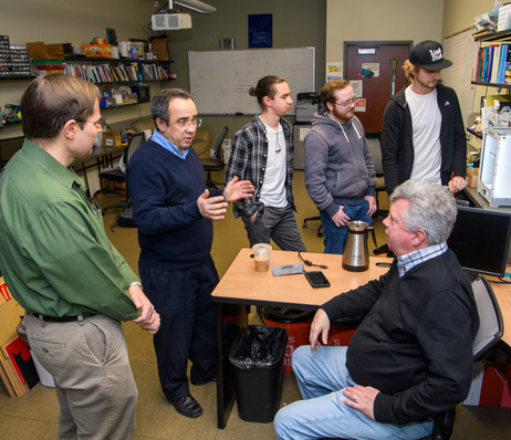 Photograph of cyber studies students in a lab